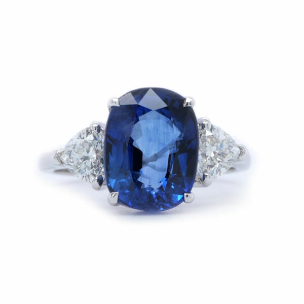 Elegant 18K White Gold Ring With 4.61 Ct Sapphire And Heart-Cut Diamonds