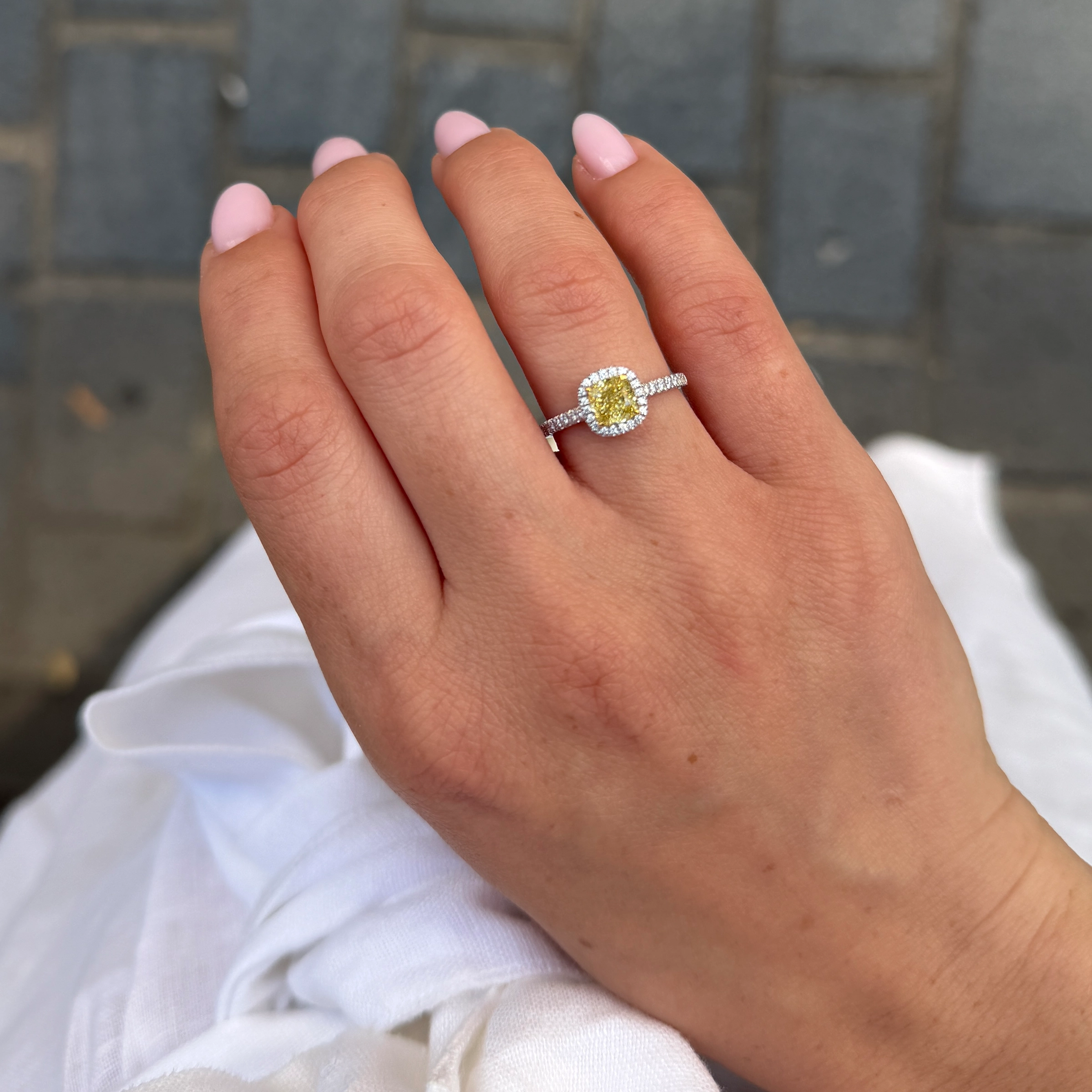 Fancy Intense Yellow Diamond Halo Ring 1.01 Ct Gia 18K White Gold Yellow Diamond Engagement Ring Worn On The Hand With 1.01 Ct Fancy Intense Yellow Center And White Diamond Halo.