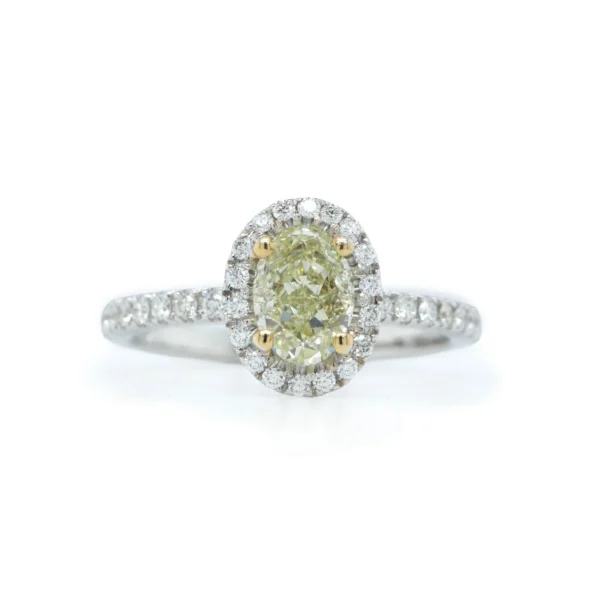 anello halo diamante ovale giallo chiaro in oro bianco 18K