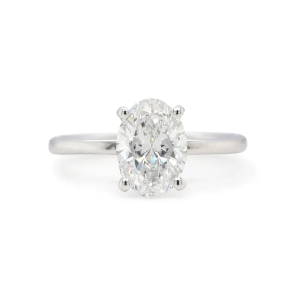 Front view of a 1.51 carat D SI1 GIA-certified oval cut diamond solitaire engagement ring set in 18k white gold.