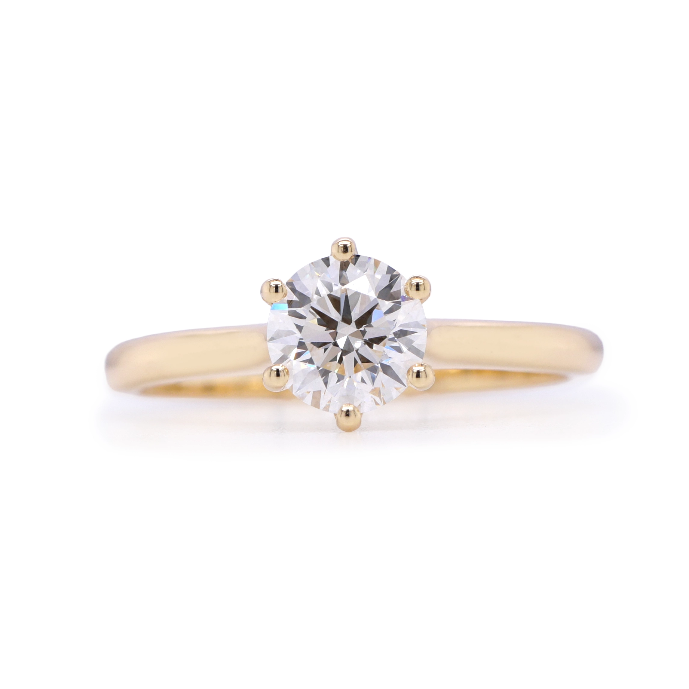 Bague Solitaire Diamant 0.70 Ct F Si1 Gia En Or Jaune 18K 1 - Orogem Jewelers Vue De Face D’une Bague Solitaire En Or Jaune 18K Sertie D’un Diamant Rond Brillant De 0.71 Ct F Si1 Certifié Gia.