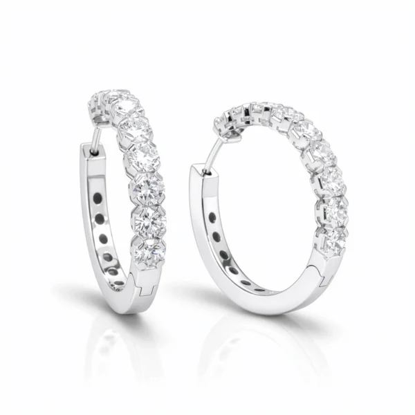 Witgouden oorringen met D–F VS diamanten