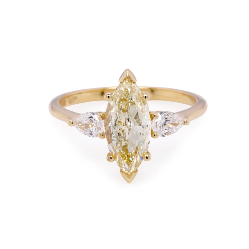 Marquise Yellow Diamond Ring With Pear Side Diamonds In 18K Gold 2 - Orogem Jewelers Front View Of Marquise-Cut Yellow Diamond Ring With Pear Side Stones