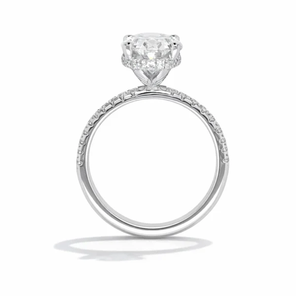 Side profile of oval lab-grown diamond ring showing halo and pavé setting