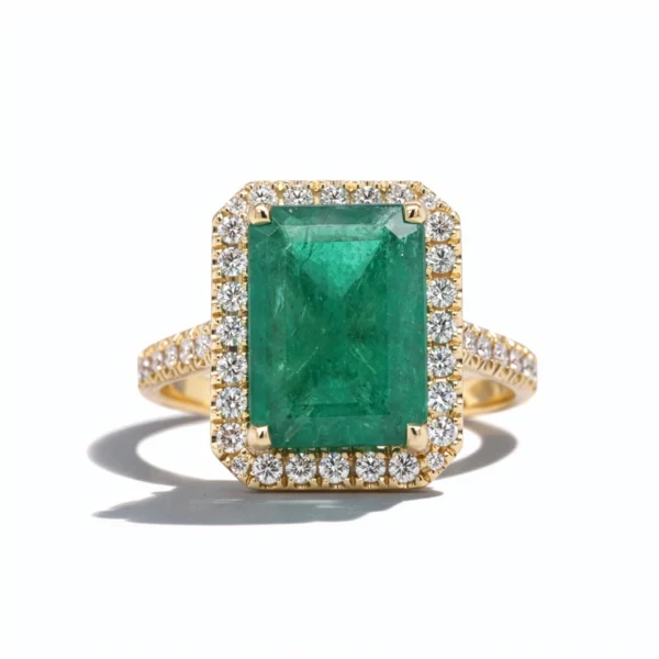 Emerald cut emerald ring with diamond halo front view in 18k yellow gold