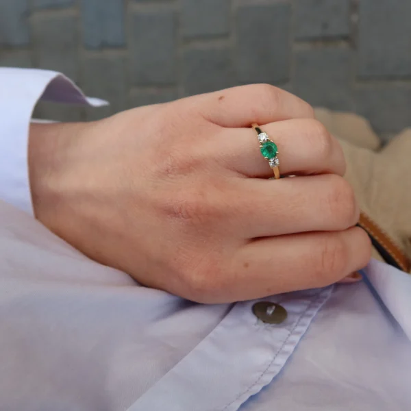 Three-stone emerald ring