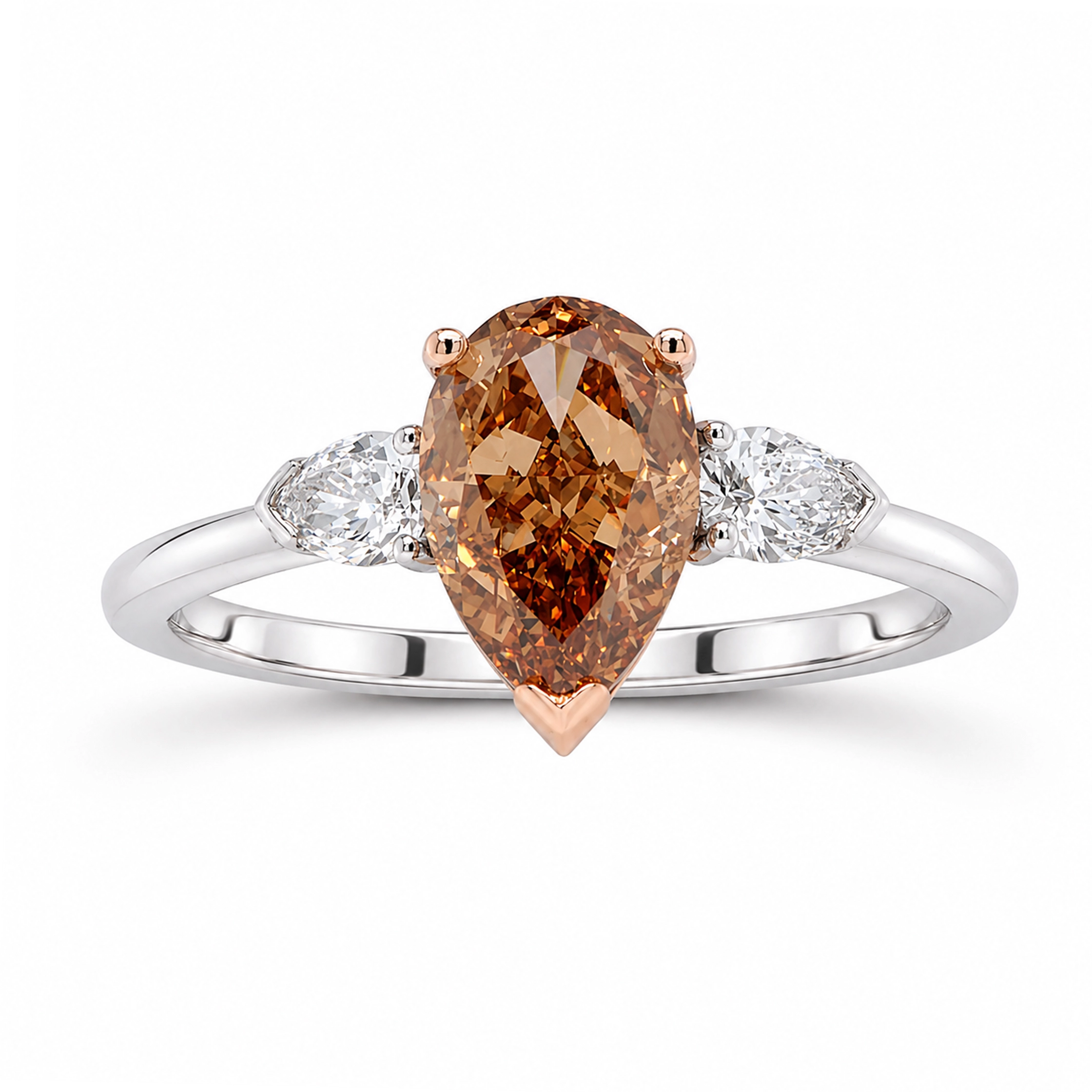 Fancy Brown-Orange Pear Diamond Ring In 18K White And Rose Gold 1 - Orogem Jewelers Pear-Shaped Fancy Brown-Orange Diamond Ring In 18K White And Rose Gold With A 1.73 Ct Gia-Certified Center Diamond And 0.27 Ct Pear-Cut Side Diamonds, Front View.