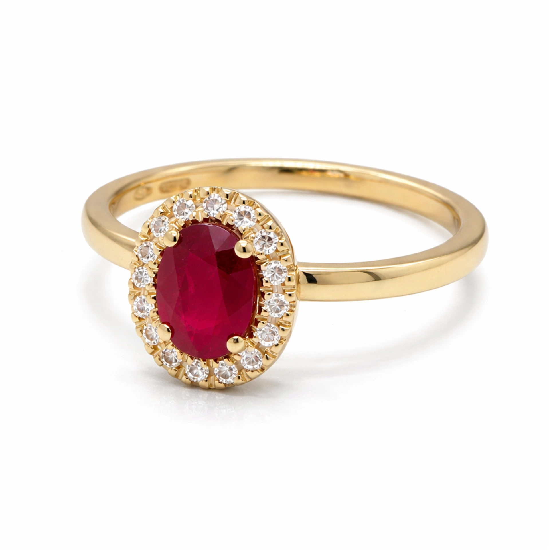 Natural Ruby Halo Ring In 18K Yellow Gold With Oval Ruby Diamonds 3 - Orogem Jewelers Angled View Of 18K Yellow Gold Ring With 0.83 Ct Oval Natural Ruby And 0.10 Ct Natural Diamond Halo.
