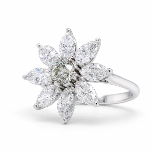 Angled View Of A Diamond Flower Ring In 18K White Gold With A 0.42 Ct Fancy Colored Center Diamond And 2.10 Ct Marquise-Cut Diamonds.