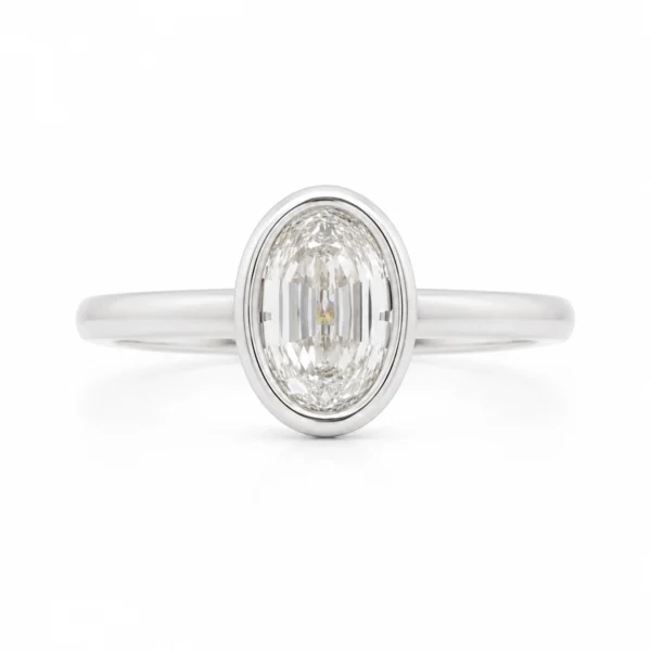 Ovale step cut bezel diamanten ring in 18k witgoud met een 1,00 ct E VS1 GIA-gecertificeerde ovale step cut diamant, vooraanzicht.