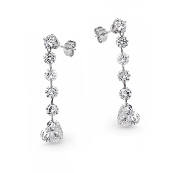 White gold heart diamond drop earrings in 18k with round brilliant diamonds and heart cut diamonds, front view.