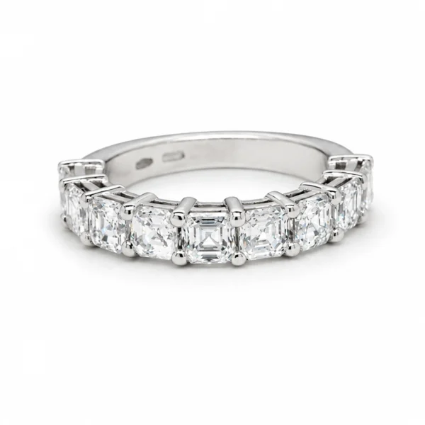 GIA certified Asscher cut diamond band with nine E VVS1/VVS2 diamonds totaling 2.82 ct set in polished 18k white gold.
