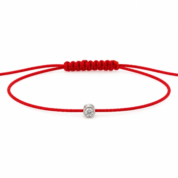 Red cord bracelet with a natural 0.07 carat round brilliant in a bezel setting in 18K white gold, with an adjustable slide knot