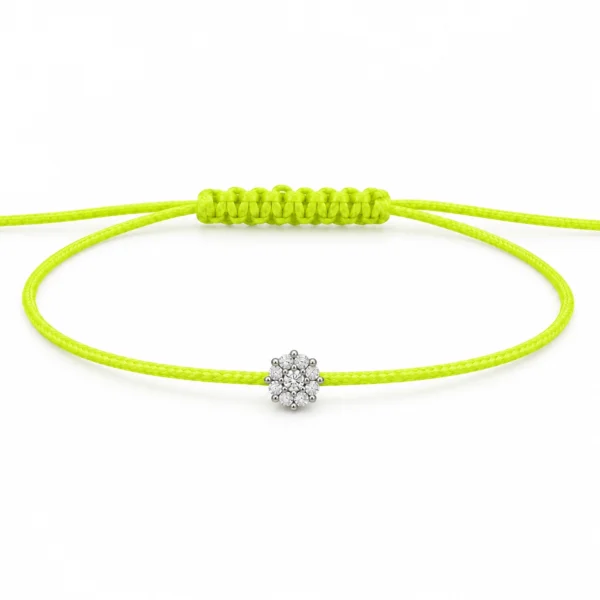Neon yellow cord bracelet with a 0.07 carat flower cluster of natural round brilliant diamonds in 18K white gold, with an adjustable slide knot